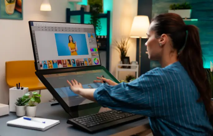 graphic designer female working on laptop