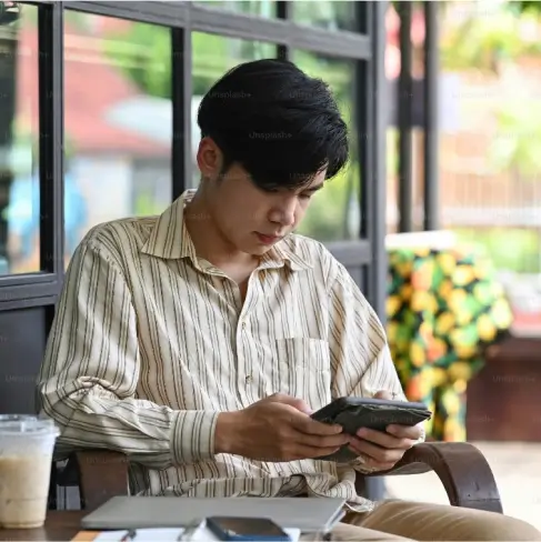 man-holding-phone man holding phone