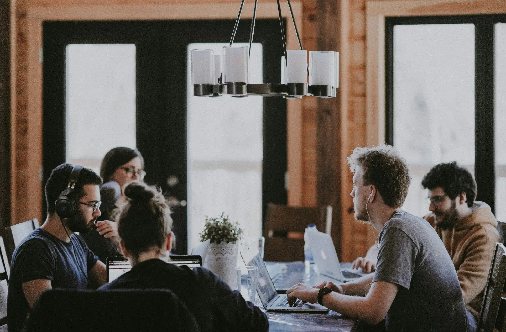 open-workspace-with-people-working-at-their-desks